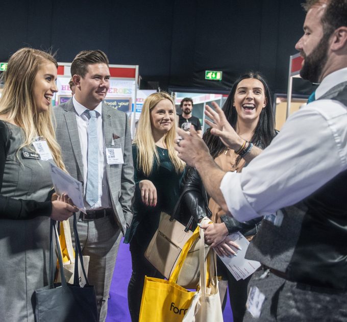 Delegates at a stand